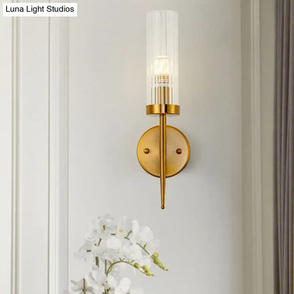 Gold ribbed glass stairway dual-light wall sconce with round backplate and tapered stem on Tampa Home & Garden Store