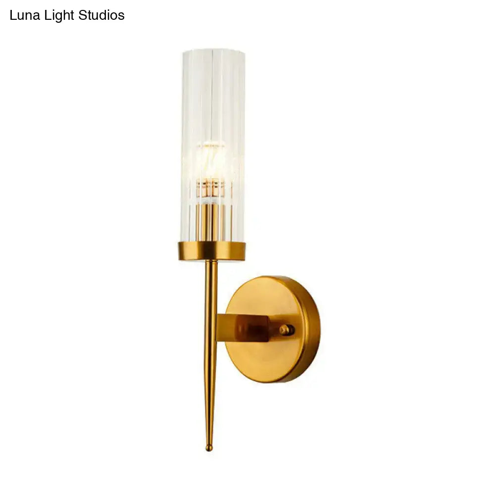 Gold ribbed glass stairway dual-light wall sconce with brass finish on Tampa Home & Garden Store