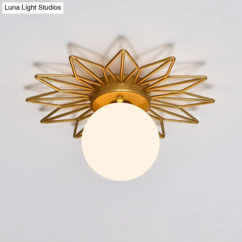 Gold-tone metal sunburst ceiling light flush mount with frosted globe by Decorbites on Tampa Home & Garden Store