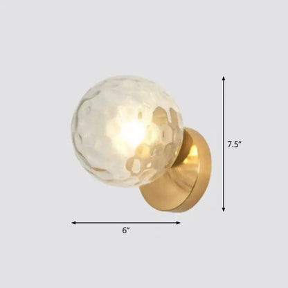 Postmodern gold textured glass ball wall sconce by Decorbites with brass mount on Tampa Home & Garden Store