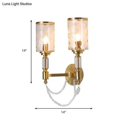 Decorbites brass wall sconce with dual crystal shades, gold finish, 14 tall by 14 wide on Tampa Home & Garden Store
