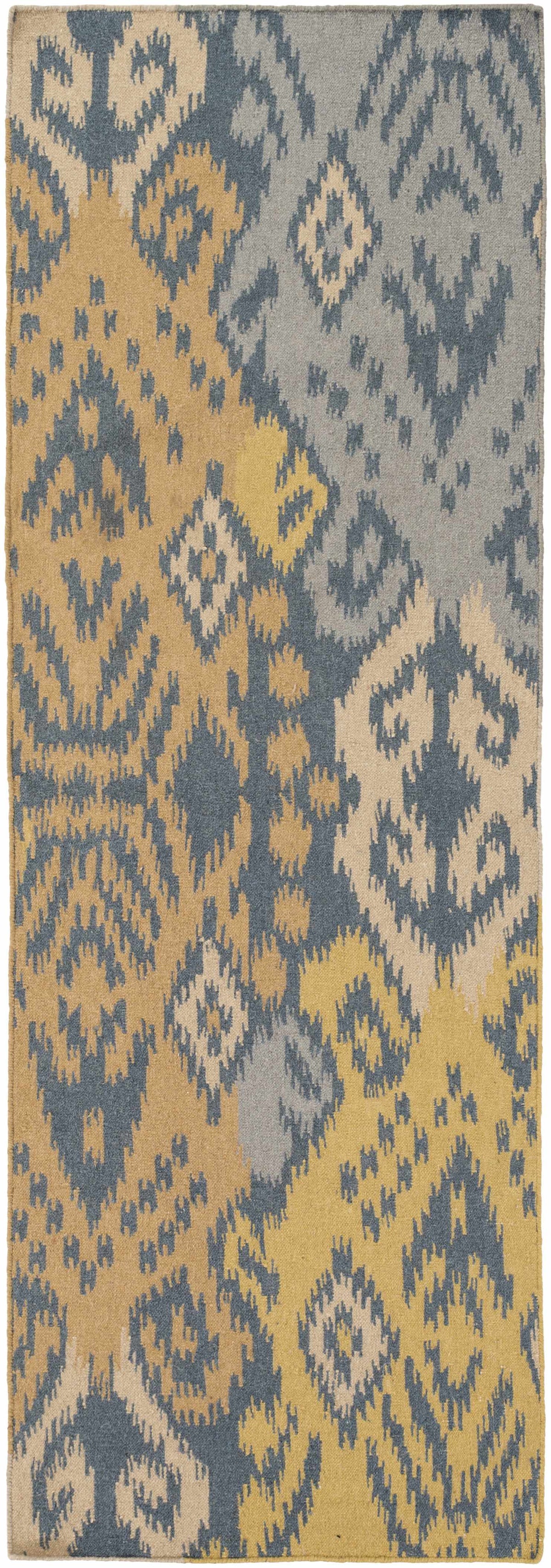 Powhattan Area Rug by Boutique Rugs in blue, beige, and tan Ikat pattern on Tampa Home & Garden Store