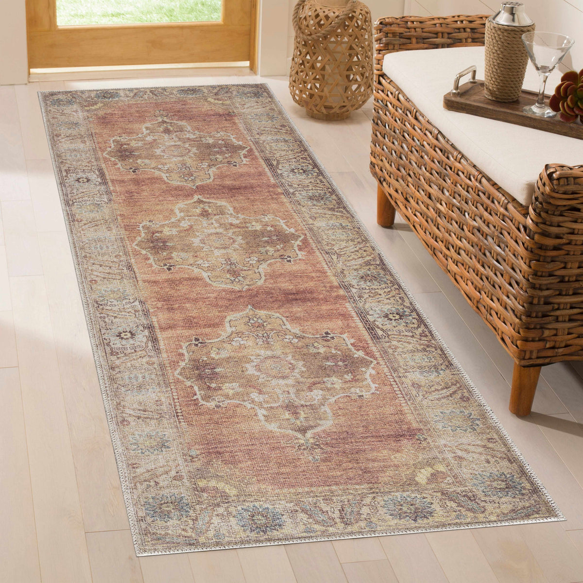 Powhatan washable area rug in rust with blue antique motif Boutique Rugs on Tampa Home & Garden Store