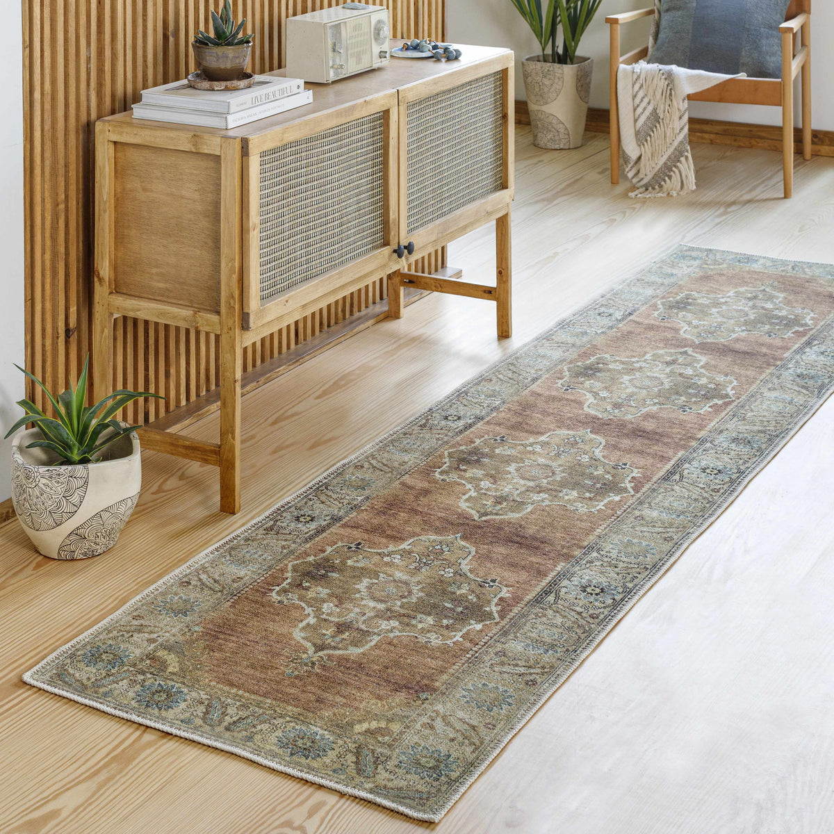 Powhatan washable area rug in brown-blue hues with medallion pattern by Boutique Rugs on Tampa Home & Garden Store
