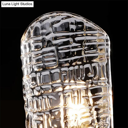Gold prism glass sconce with clear faceted glass and warm glow by Decorbites on Tampa Home & Garden Store
