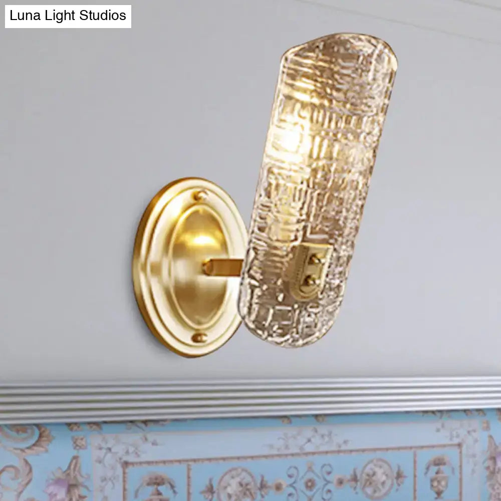 Gold Prism Glass Sconce by Decorbites; gold metal backplate, curved arm, textured crystal shade on Tampa Home & Garden Store