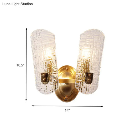 Gold Prism Glass Sconce by Decorbites with two textured glass shades and brass backplate on Tampa Home & Garden Store