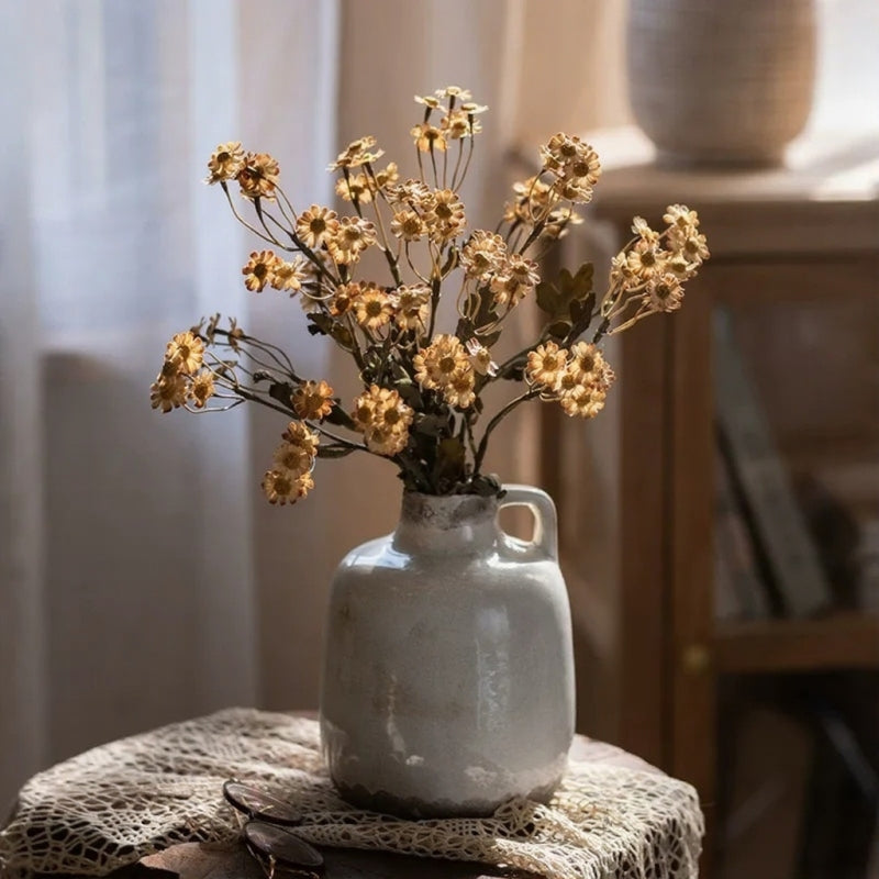 Autumn Daisy Spray 21in artificial flowers in a gray ceramic pitcher vase on a lace doily on Tampa Home & Garden Store