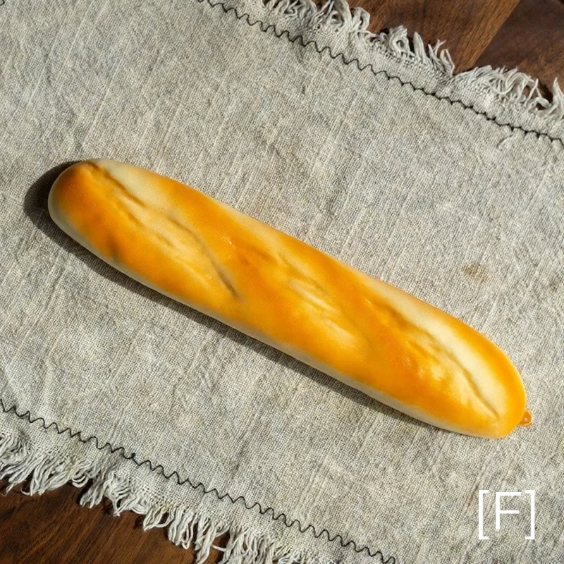 Artificial Bread & Pastry Display Props by RusticReach in golden-orange on linen on Tampa Home & Garden Store