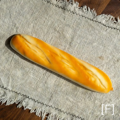Artificial Bread & Pastry Display Props by RusticReach in golden-orange on linen on Tampa Home & Garden Store
