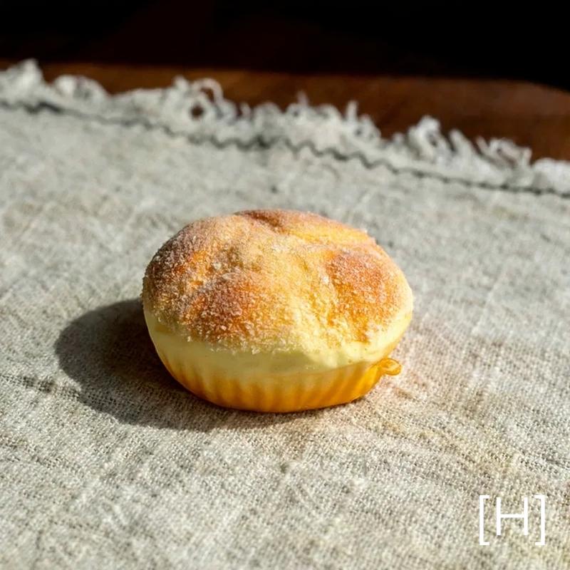Artificial Bread & Pastry Display Prop sugar-dusted bun with golden crust on linen RusticReach on Tampa Home & Garden Store