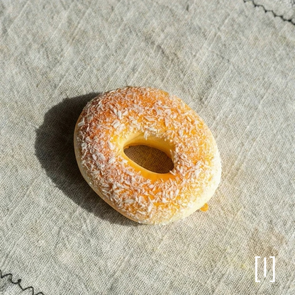 Artificial Bread & Pastry Display Prop bagel with coconut flakes on linen backdrop RusticReach on Tampa Home & Garden Store