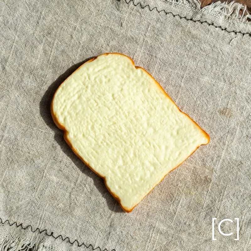 Artificial Bread & Pastry Display Prop slice in ivory with light crust on linen RusticReach 1 piece on Tampa Home & Garden Store