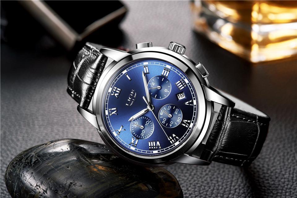 Men's Stevvex watch with blue chronograph dial, Roman numerals, date window and black leather strap on Tampa Home & Garden Store