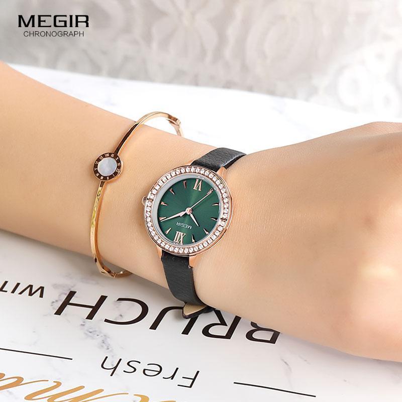 Stevvex green dial women's quartz watch with crystal bezel and black leather strap on wrist on Tampa Home & Garden Store