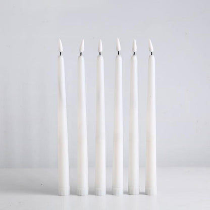 Six white plastic flameless LED taper candles with warm flicker on Tampa Home & Garden Store
