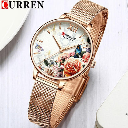 Womens Curren watch with decoupage floral dial and large Roman numerals rose gold mesh band on Tampa Home & Garden Store