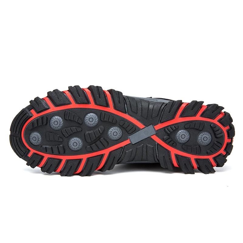 Waterproof winter boots outsole in black rubber with red trim and rugged tread on Tampa Home & Garden Store