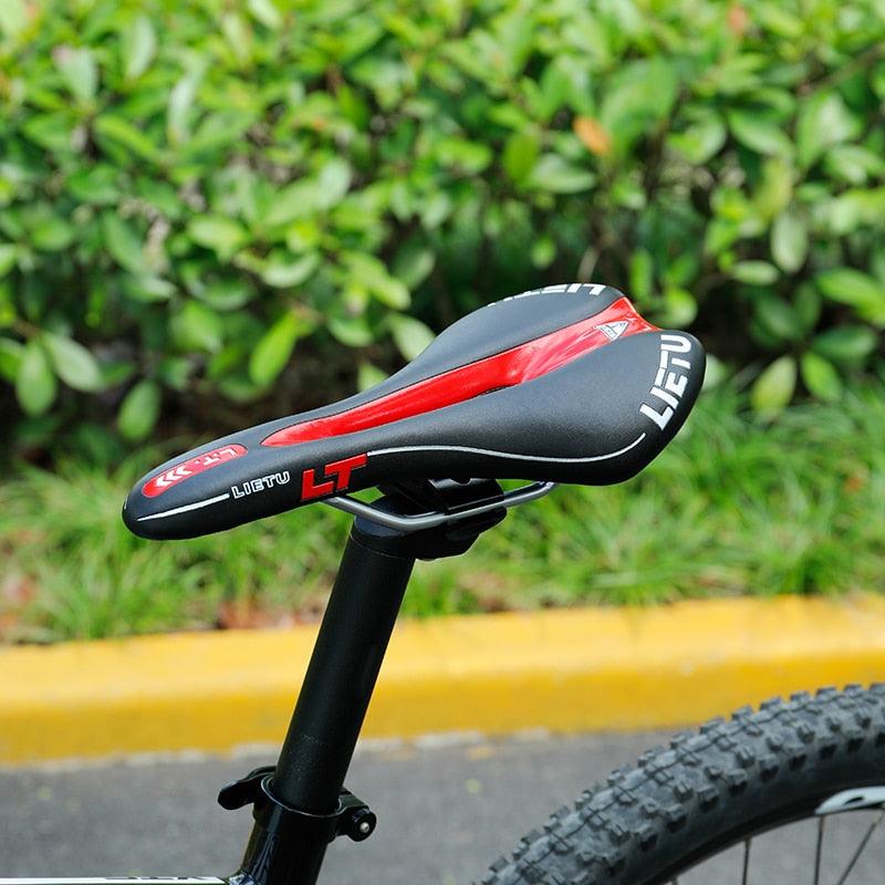 bicycle saddle ergonomic bike seat with black PU leather texture and steel rails red accents on Tampa Home & Garden Store