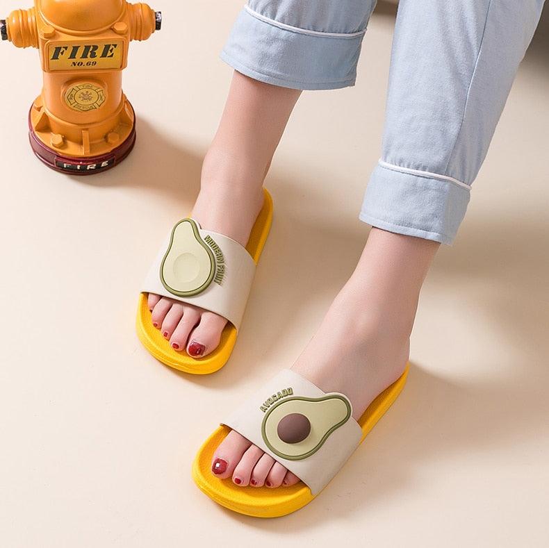 Stevvex casual avocado flip flops pair; yellow soles, beige strap with avocado graphic, unisex on Tampa Home & Garden Store