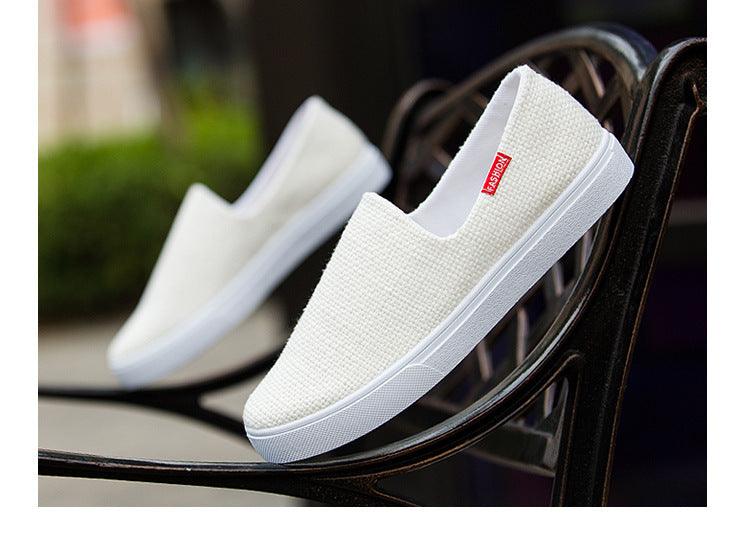 Stevvex white canvas slip-on sneakers, lightweight unisex casual flat shoes on Tampa Home & Garden Store