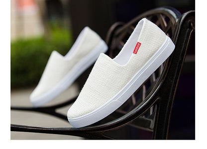 Stevvex white canvas slip-on sneakers, lightweight unisex casual flat shoes on Tampa Home & Garden Store