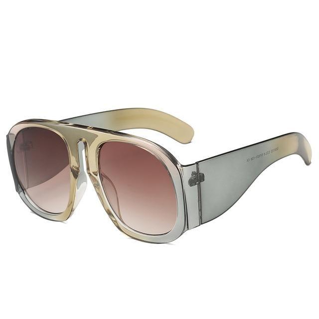 Retro round oversized unisex sunglasses with gradient pink lenses and beige-tan frame on Tampa Home & Garden Store