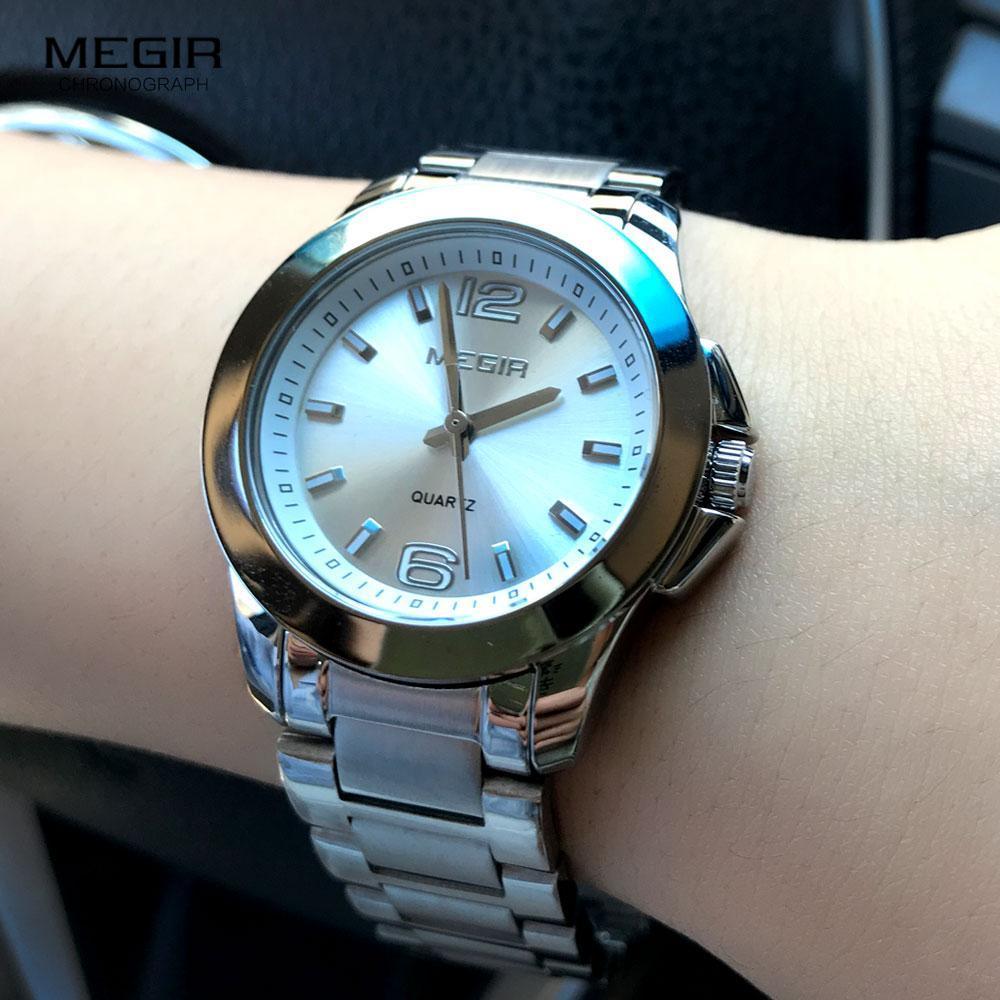 Megir stainless steel quartz wristwatch with silver dial on women's wrist on Tampa Home & Garden Store