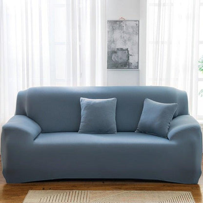Stevvex blue solid-color sofa slipcover with elastic bottom on a 3-4 seater sofa on Tampa Home & Garden Store