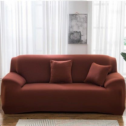 Stevvex elastic solid color sofa cover for 3-seat sofa in rust red with stretch bottom on Tampa Home & Garden Store