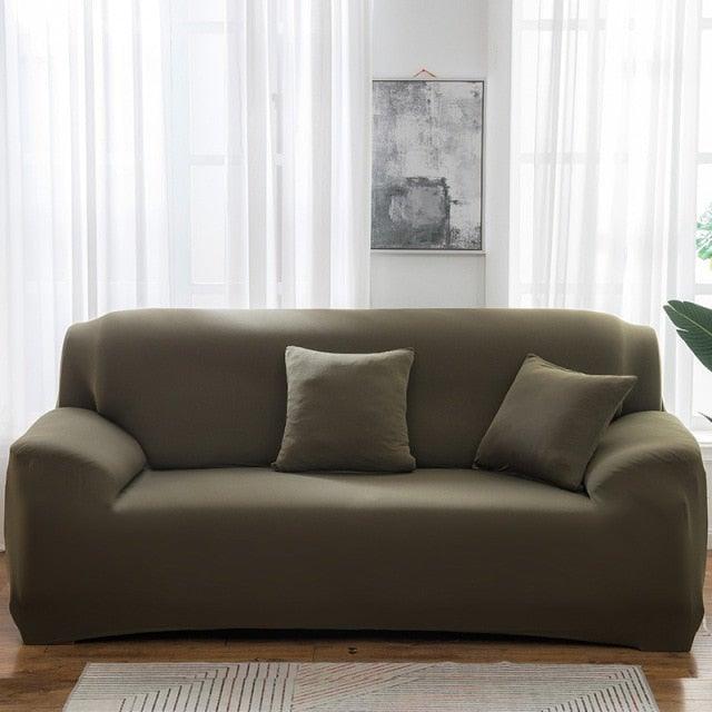 Stevvex elastic spandex sofa cover on olive green 3-seat sofa with elastic bottom on Tampa Home & Garden Store