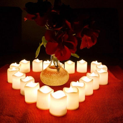Stevvex flameless LED tea lights 24-pack, warm white flickering candles around a glass vase on Tampa Home & Garden Store