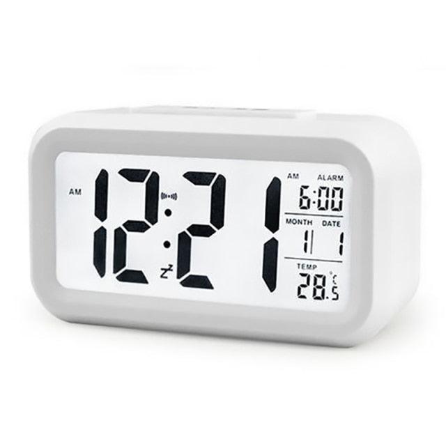 Stevvex digital alarm clock with large LCD display, white plastic body, date and temp desk clock on Tampa Home & Garden Store