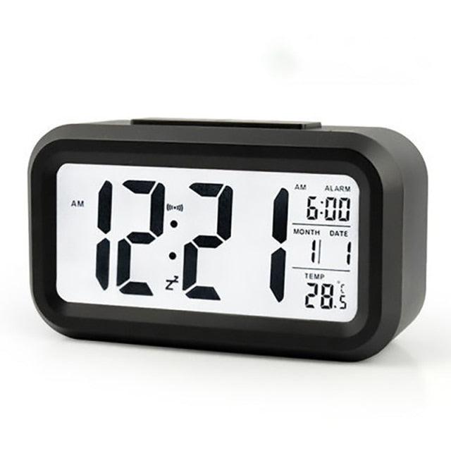 Stevvex digital alarm clock with LED display, black plastic case, temp and date readouts on Tampa Home & Garden Store