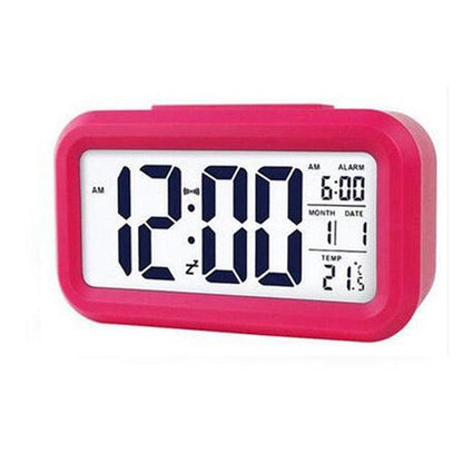 Stevvex pink digital alarm clock with large LCD display, battery-operated desk clock on Tampa Home & Garden Store