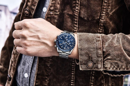 Men's Stevvex analog blue dial stainless steel chronograph watch ST665NURAZ44 on wrist on Tampa Home & Garden Store