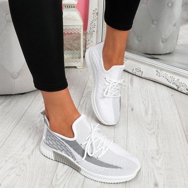 Sneakers Stevvex white mesh lace-up casual walking shoes pair with gray side panels on Tampa Home & Garden Store