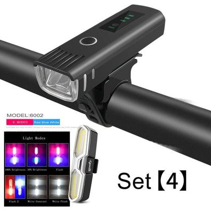 Bike light set with Stevvex front headlight and USB-rechargeable rear taillight, 4 modes mounted on bars on Tampa Home & Garden Store