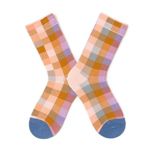 Novelty women's crew socks in pastel pink, peach, lavender checkered pattern with blue toes on Tampa Home & Garden Store