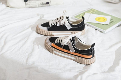 Stevvex womens canvas sneakers black with white laces beige sole; two pairs, one with orange stripe on Tampa Home & Garden Store