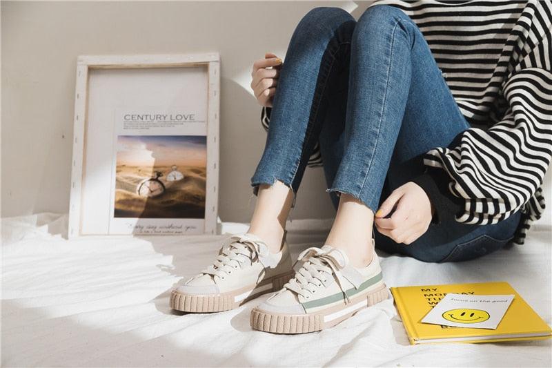 Stevvex women's canvas sneakers with low-cut beige uppers and green side stripe chunky sole on Tampa Home & Garden Store