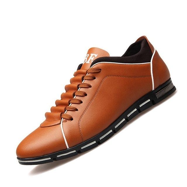 Stevvex men's leather sneakers in tan brown with white piping and segmented black sole on Tampa Home & Garden Store