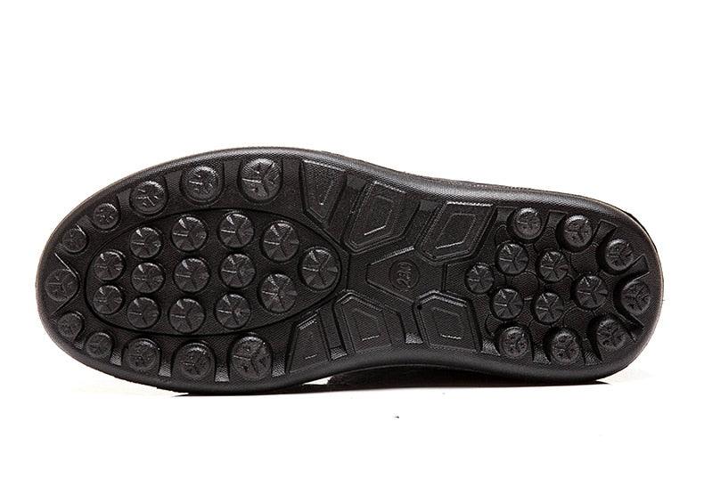 Women's winter boots outsole in black rubber with circular lug tread on Tampa Home & Garden Store