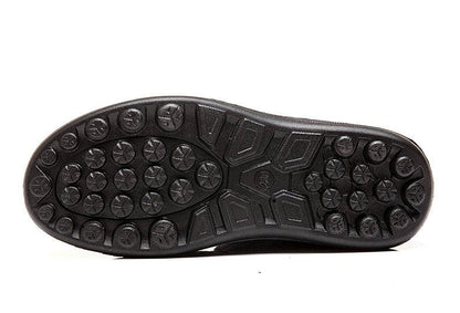 Women's winter boots outsole in black rubber with circular lug tread on Tampa Home & Garden Store