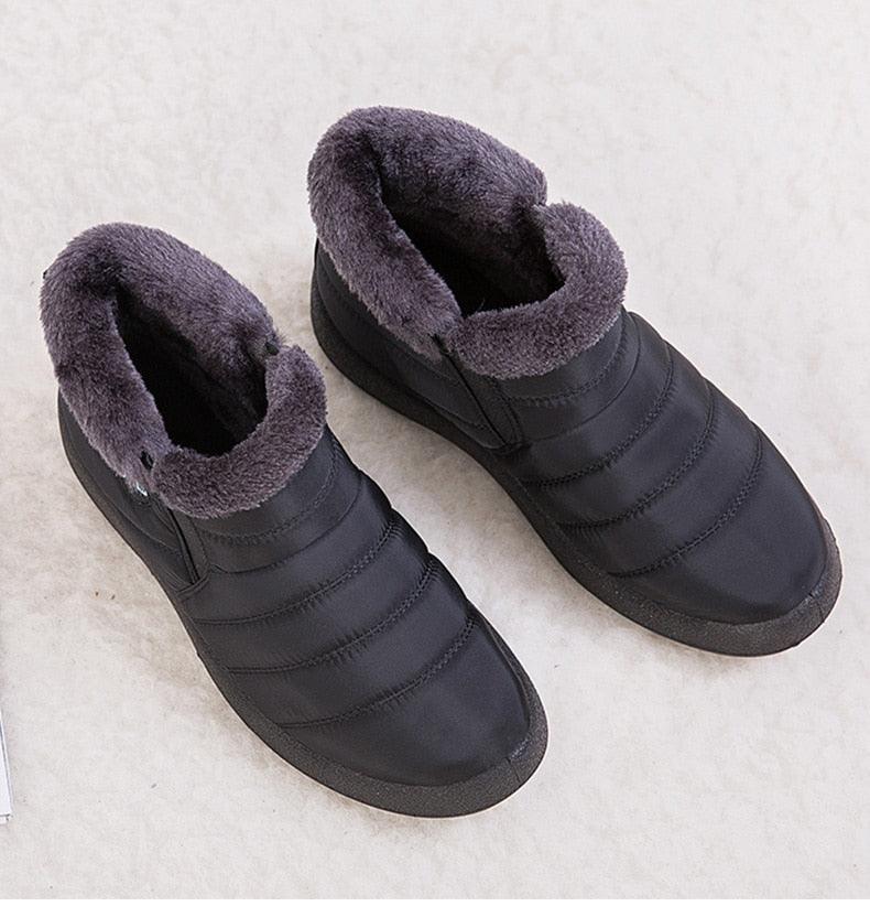 Stevvex Women Waterproof Snow Boots with purple faux fur lining, slip-on ankle warmth on Tampa Home & Garden Store