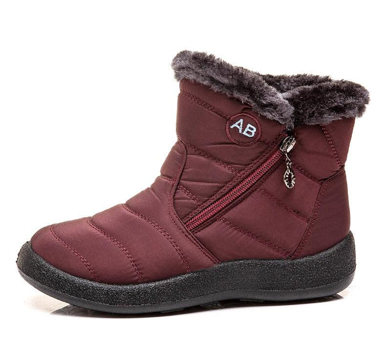 Stevvex Women's burgundy waterproof snow boots with faux fur lining and side zipper AB badge on Tampa Home & Garden Store