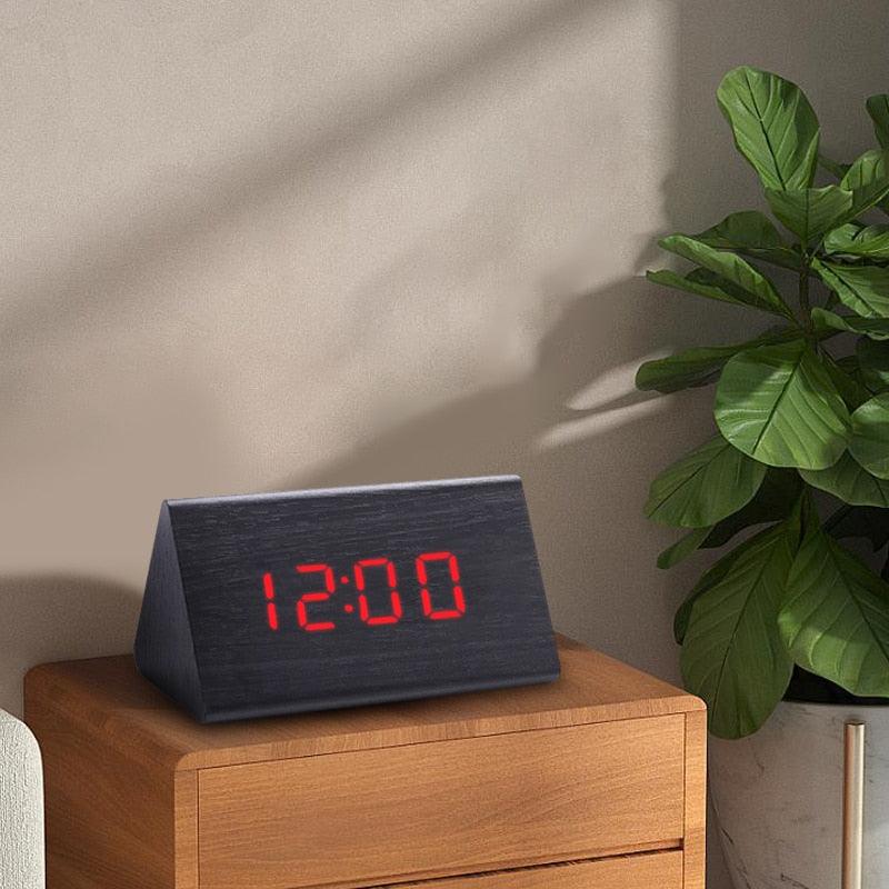 Stevvex digital alarm clock in dark wood with red LED time display on a wooden dresser on Tampa Home & Garden Store