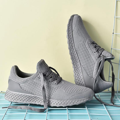Men's Stevvex sneakers with grey breathable mesh upper, lace-up, athletic running style on Tampa Home & Garden Store