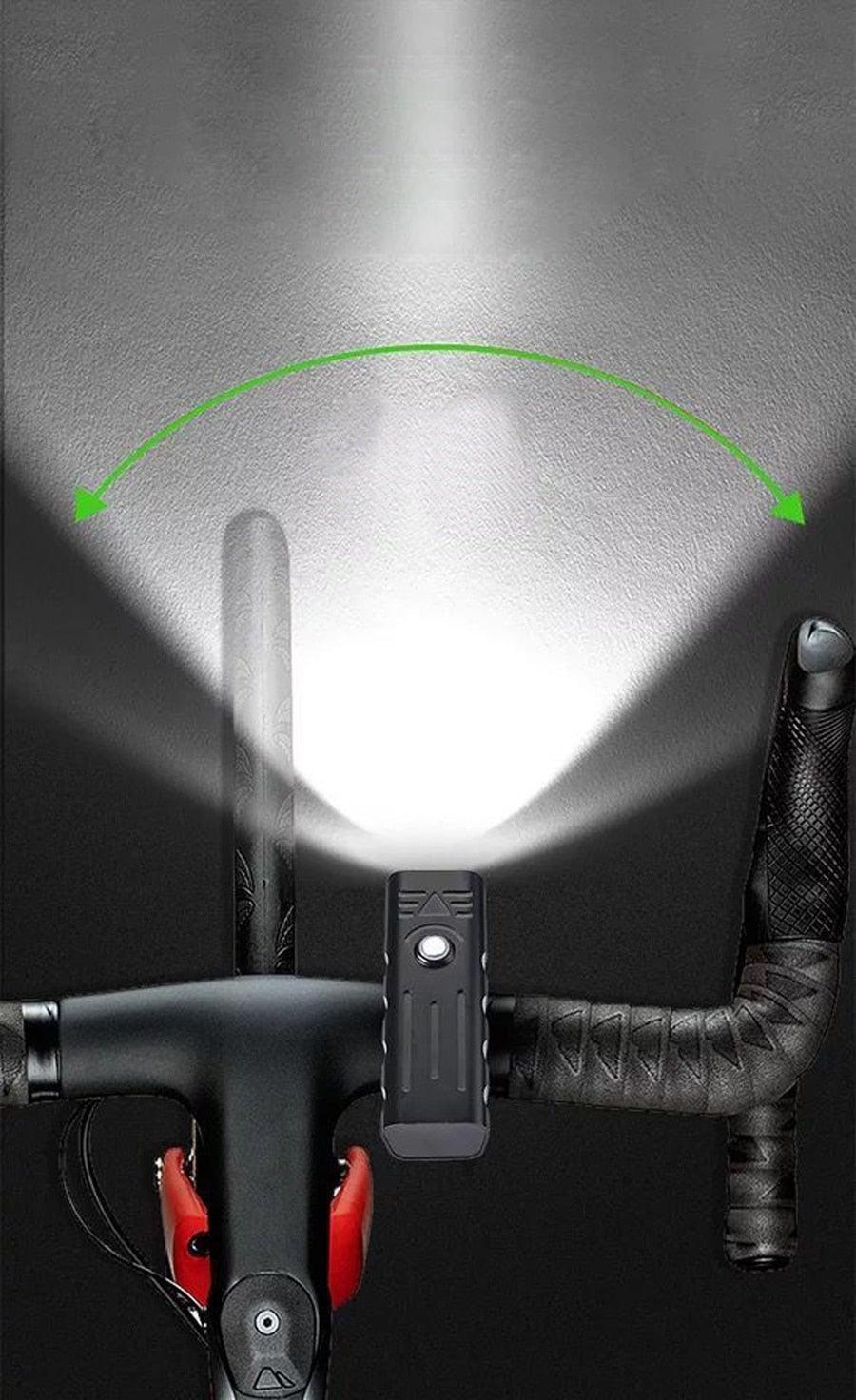 Stevvex black bike headlight mounted on handlebars with wide beam on Tampa Home & Garden Store