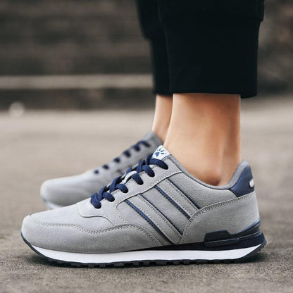 Stevvex men's blue gray casual sneakers with artificial leather upper and navy laces on Tampa Home & Garden Store